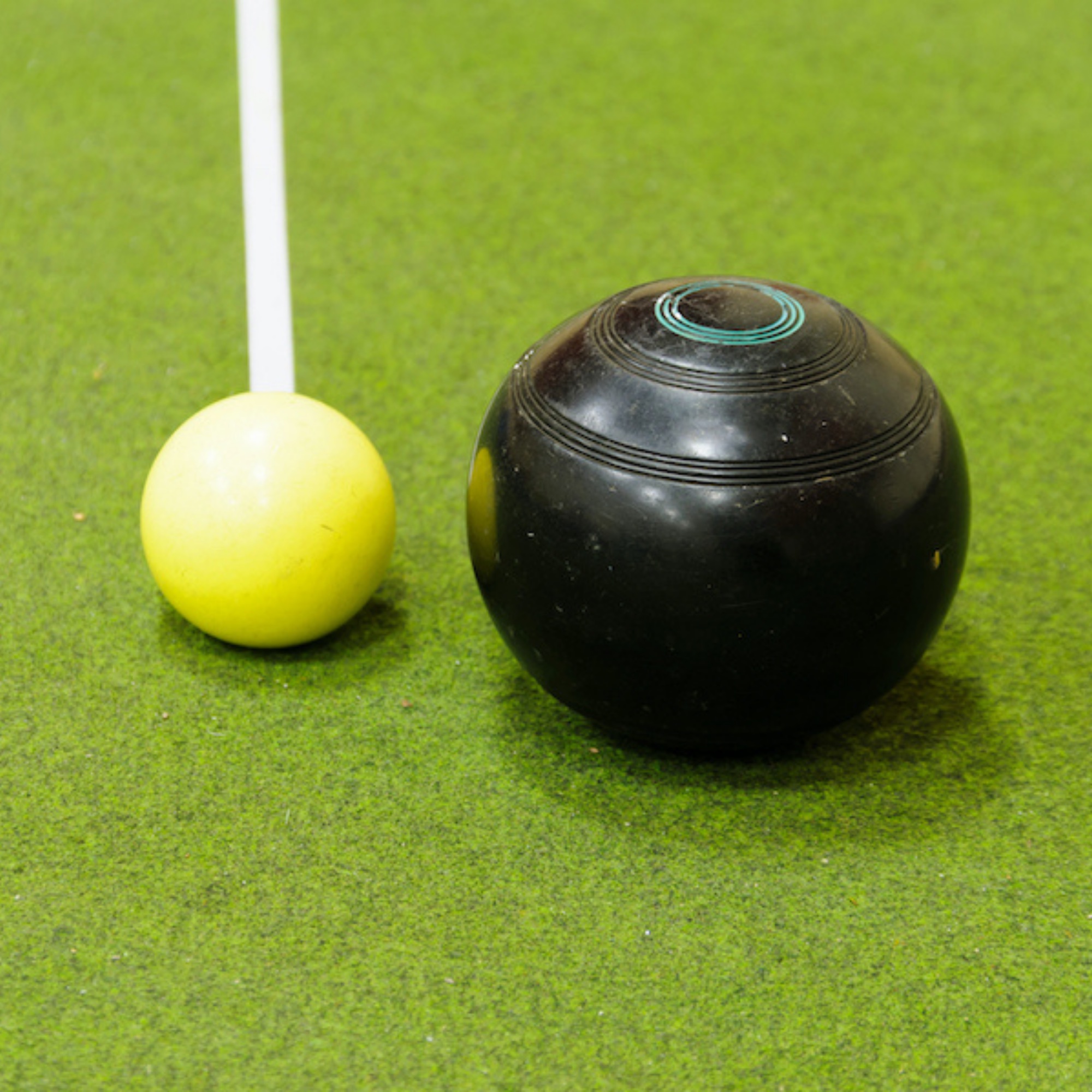 People playing indoor bowls in the church hall